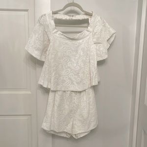 Backless white rumper. Size XS